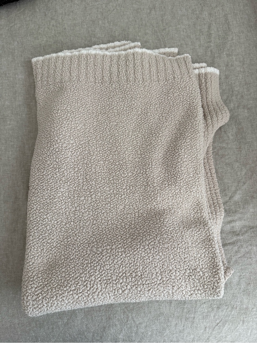 Barefoot dreams throw in taupe